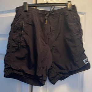 Men’s American Eagle black nylon shorts.